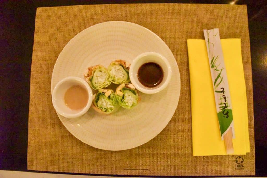 Fresh Summer Roll with tofu, lettuce, coriander and mint along with hoisin and peanut sauces.